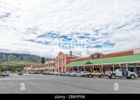 HARRISMITH, SOUTH AFRICA - MARCH 16, 2020:  A street scene, with businesses and vehicles, in Harrismith in the Free State Province Stock Photo