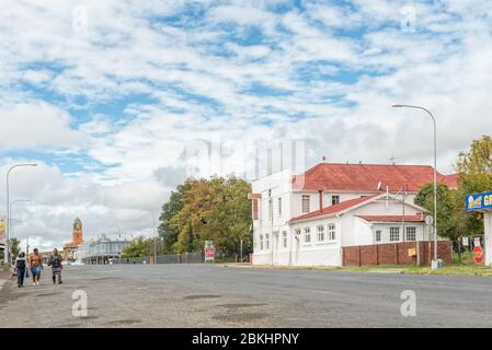 HARRISMITH, SOUTH AFRICA - MARCH 16, 2020:  A street scene in Harrismith in the Free State Province. A hotel and people are visible Stock Photo