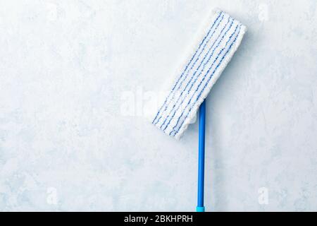 Floor mop on light background Stock Photo
