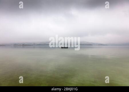 France, Savoie, before Savoyard country, Lake Aiguebelette in the mist Stock Photo