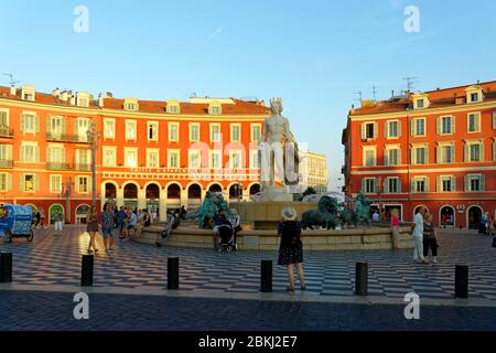 France, Alpes-Maritimes, Nice, old town, Place Massena, the Fontaine du Soleil (Sun fountain) and the Apollon statue Stock Photo