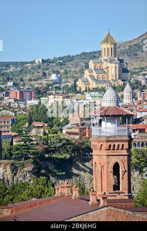 Jumah Mosque and the Holy Trinity Cathedral of Tbilisi; panoramic view from Sololaki Hill  (Tbilisi, Republic of Georgia) Stock Photo