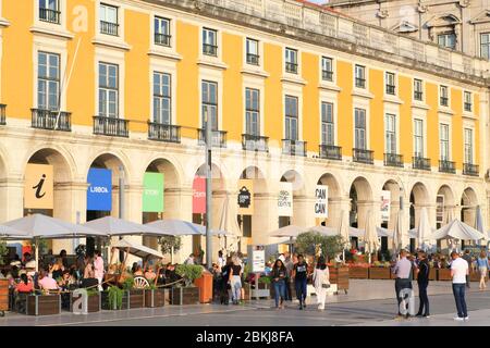 Portugal, Lisbon, Baixa, Praça do Comércio (Commerce Square), café terrace with 18th century facades Stock Photo