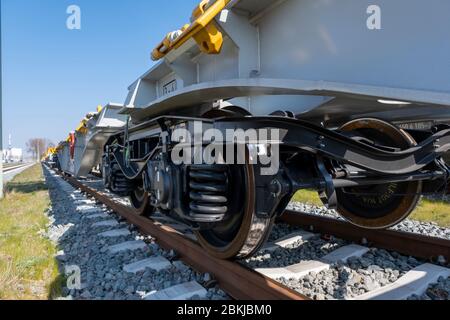 Cargo trains close-up. Aerial view of colorful freight trains on the railway station. Wagons with goods on railroad. Heavy industry. Industrial concep Stock Photo
