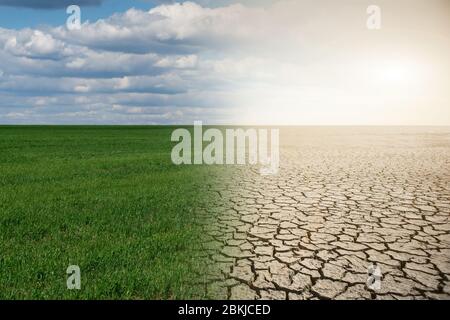 Landscape with half green field and half desert. Global warming concept Stock Photo