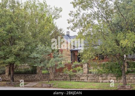 HARRISMITH, SOUTH AFRICA - MARCH 16, 2020:  An old, histroric sandstone house in Harrismith in the Free State Province Stock Photo