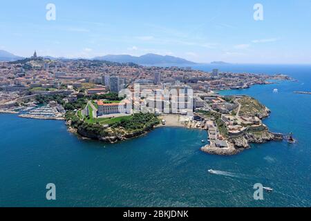 France, Bouches du Rhone, Marseille, 7th arrondissement, Pharo district, Pharo palace and Pharo cove, Pointe du Pharo, Notre Dame de la Garde basilica in the background (aerial view)