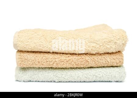 Pile of towels on white background Stock Photo