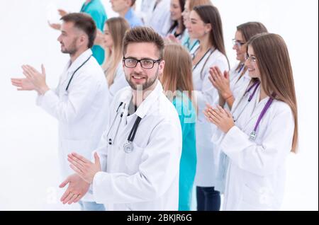 side view. a group of applauding doctors looking at the camera Stock Photo