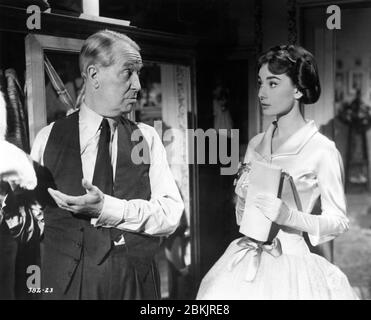 MAURICE CHEVALIER and AUDREY HEPBURN in LOVE IN THE AFTERNOON 1957 director BILLY WILDER screenplay Billy Wilder and I.A.L. Diamond Billy Wilder Productions / Allied Artists Pictures Stock Photo
