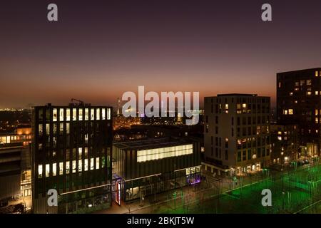 Eindhoven, The Netherlands, December 3rd 2019. A view of Eindhoven city with the famous Strijp S, school and evoluon during sunset twilight with a dee Stock Photo