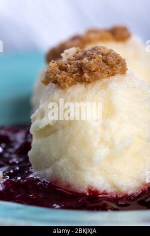 austrian curd noodles on plum sauce Stock Photo