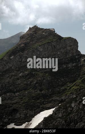 Idiosyncratic peak like a lopsided wedding cake in Malbun, Liechtenstein Stock Photo