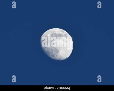 Glasgow, Scotland, UK. 4th, May, 2020. Weather over Glasgow. The waxing gibbous moon shining brightly tonight in clear skys and a moderate breeze will see temperatures dropping overnight to around 3 degrees centigrade in Glasgow. Credit Douglas Carr/Alamy live News Stock Photo