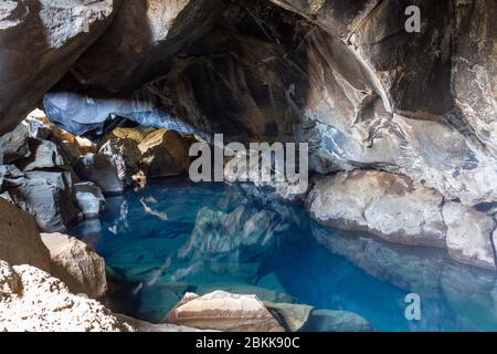 The Grjótagjá cave, a lava cave with beautifully clear thermal spring (featured in 'Game of Thrones'), Myvatn, Iceland. Stock Photo