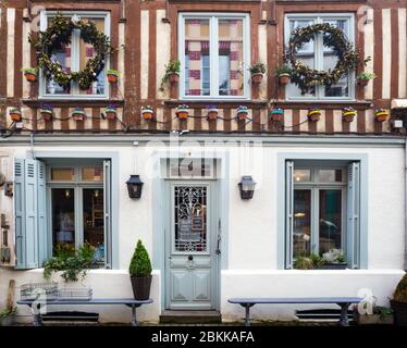 HONFLEUR, FRANCE - APRIL 8, 2018: view of the facade of the shop in the famous French city Honfleur. Normandy, France Stock Photo