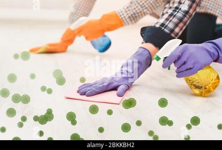 Unrecognizable people in rubber gloves washing floor at home, collage with bacreria and virus cells Stock Photo