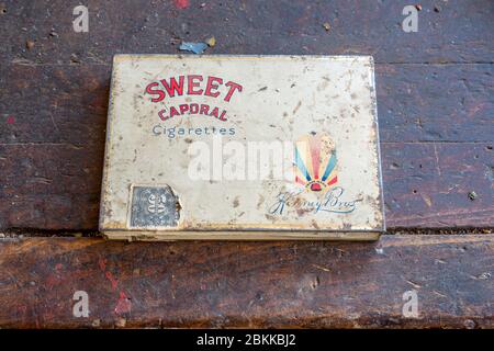 Swift Current, SK/Canada- May 1, 2020:  A vintage 1940s WWII Sweet Caporal Cigarettes tin Stock Photo