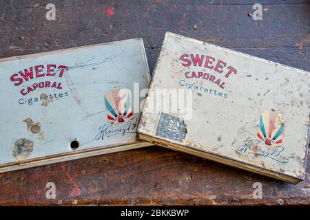 Swift Current, SK/Canada- May 1, 2020:  Two vintage 1940s WWII Sweet Caporal Cigarettes tins Stock Photo