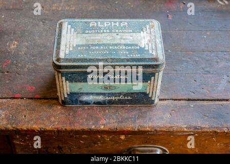 Swift Current, SK/Canada- May 1, 2020: An antique Alpha dustless chalk crayon tin in an old workshop Stock Photo