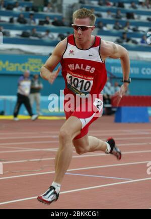 MANCHESTER - JULY 27: Tim BENJAMIN of Wales compete in Semi-Final 2 Men's 400m at City of Manchester Stadium during the 2002 Commonwealth Games, Manch Stock Photo