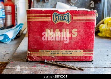 Swift Current, SK/Canada- May 1, 2020: A vintage box of Stelco nails in an old workshop Stock Photo