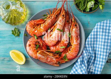 Close up of argentinian red prawns on aqua menthe background Stock Photo