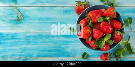 Top veiw of fresh and juicy strawberry on light blue background Stock ...