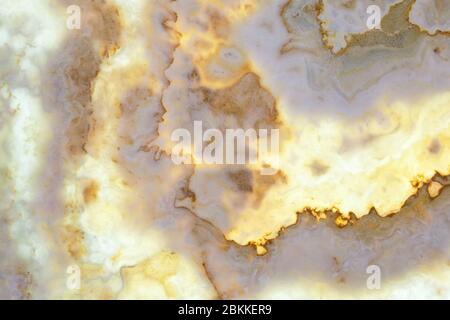Futuristic stains and bright light on marble surface Stock Photo