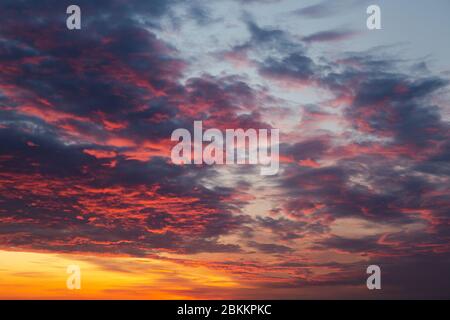 Sunrise with blue cloud on orange sky Stock Photo
