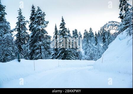 Snow packed road in Norway Stock Photo