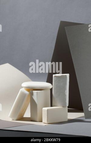 Set of white soapsuds on gray background, abstract geometry concept of skincare, sustainable wellness, matte texture stylish background for luxury spa Stock Photo