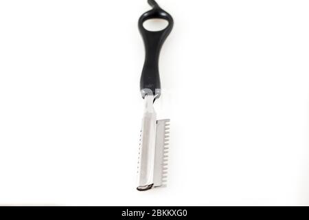 Metal color sharp straight razor on a bright isolated on white Stock Photo