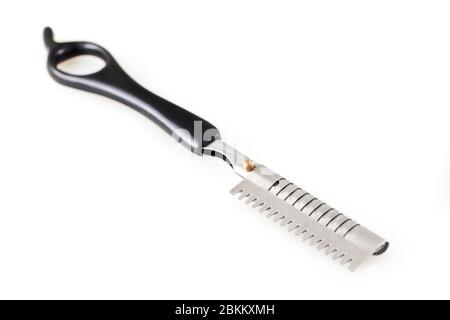 Metal color sharp straight razor on a bright isolated on white Stock Photo