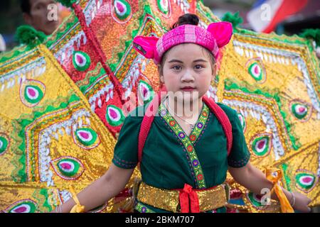 Cute girl of Shan or Tai Yai (ethnic group living in parts of Myanmar and Thailand) in tribal dress on Shan New Year Stock Photo