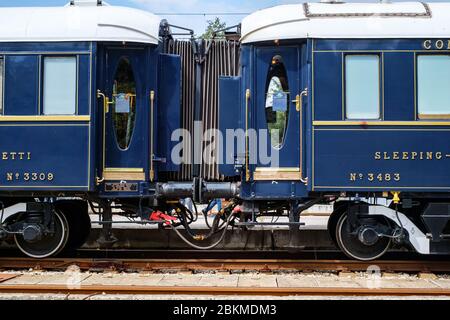 Ruse city, Bulgaria - August 29, 2017. The legendary Venice Simplon Orient Express is ready to depart from Ruse Railway station. Sleeper. The luxury t Stock Photo