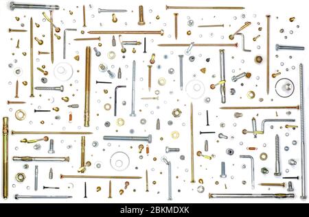 screws, nuts, washers, staples, rivets and springs isolated on a white background, top view Stock Photo