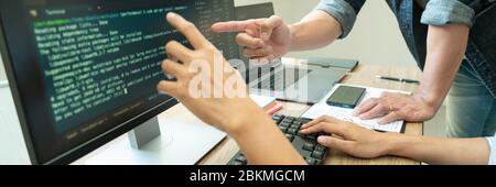 Collaborative work Software engineers website developer technologies or programmer working coding on startup ai application project on screen with par Stock Photo