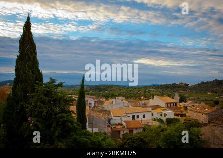 Morning view across the rooftops of the town of Caimari, near Selva and Inca, in central northwest Mallorca, famous for its olives. Stock Photo