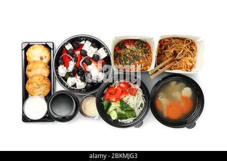 Food delivery. Food in take away boxes isolated on white background Stock Photo