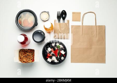 Flat lay with takeaway food on white background. Food delivery Stock Photo