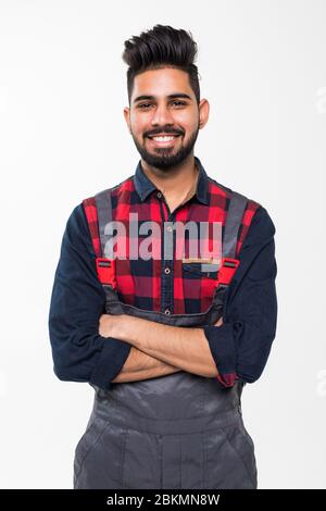 Portrait of smiling worker in blue uniform isolated on white background Stock Photo