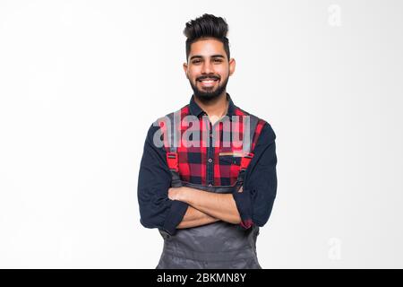 Portrait of smiling worker in blue uniform isolated on white background Stock Photo