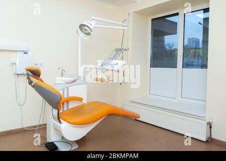 Interior stylish modern dentist office in orange style Stock Photo