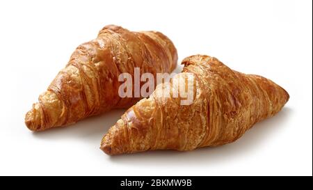 freshly baked croissants isolated on white background Stock Photo