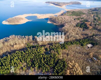 Aerial view of reinforced concrete bunkers belonged to Headquarters of German Land Forces from ww2 hidden in a forest on the Mamry Lake shore, Mamerki Stock Photo