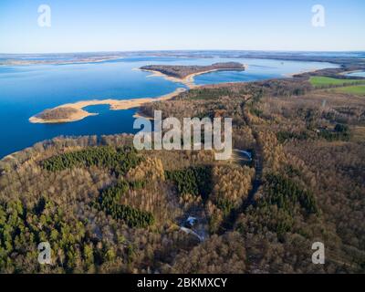 Aerial view of reinforced concrete bunkers belonged to Headquarters of German Land Forces from ww2 hidden in a forest on the Mamry Lake shore, Mamerki Stock Photo