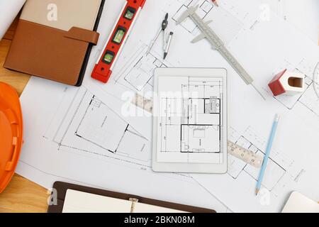 Engineer and Architect concept, Top view of Interior designer desk with blueprint Stock Photo