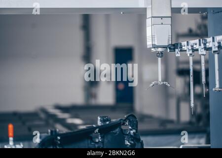 Close up of 3D dimension measurement plastic parts by CMM, 3D automatic measuring system Stock Photo