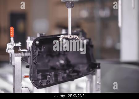 Close up of 3D dimension measurement plastic parts by CMM, 3D automatic measuring system Stock Photo